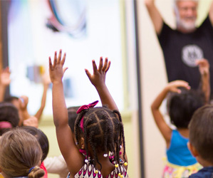 Children with their hands up